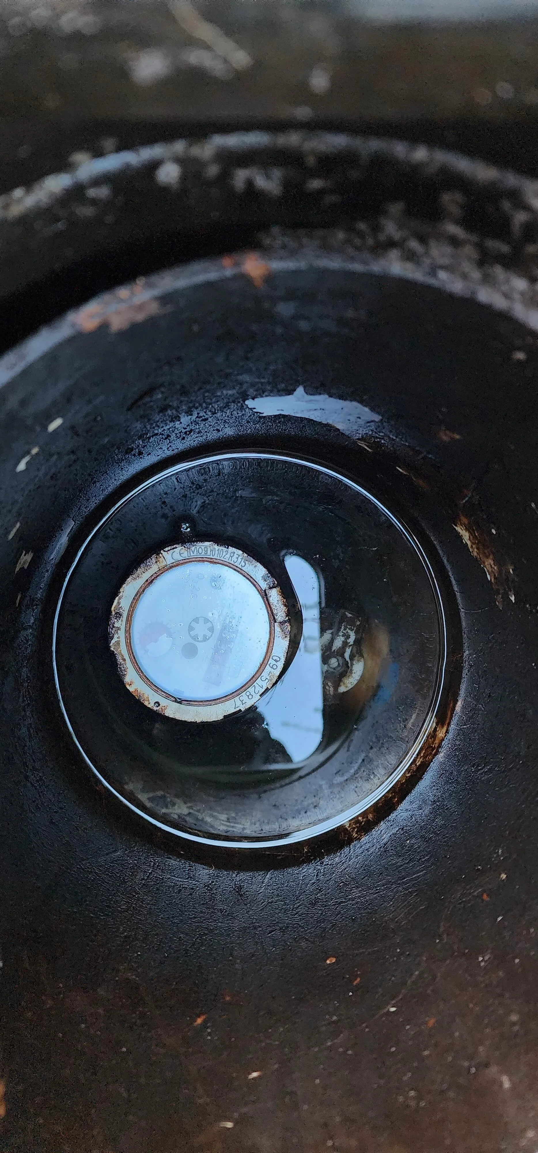 Water meter chamber checked during mains water leak detection in Addlestone