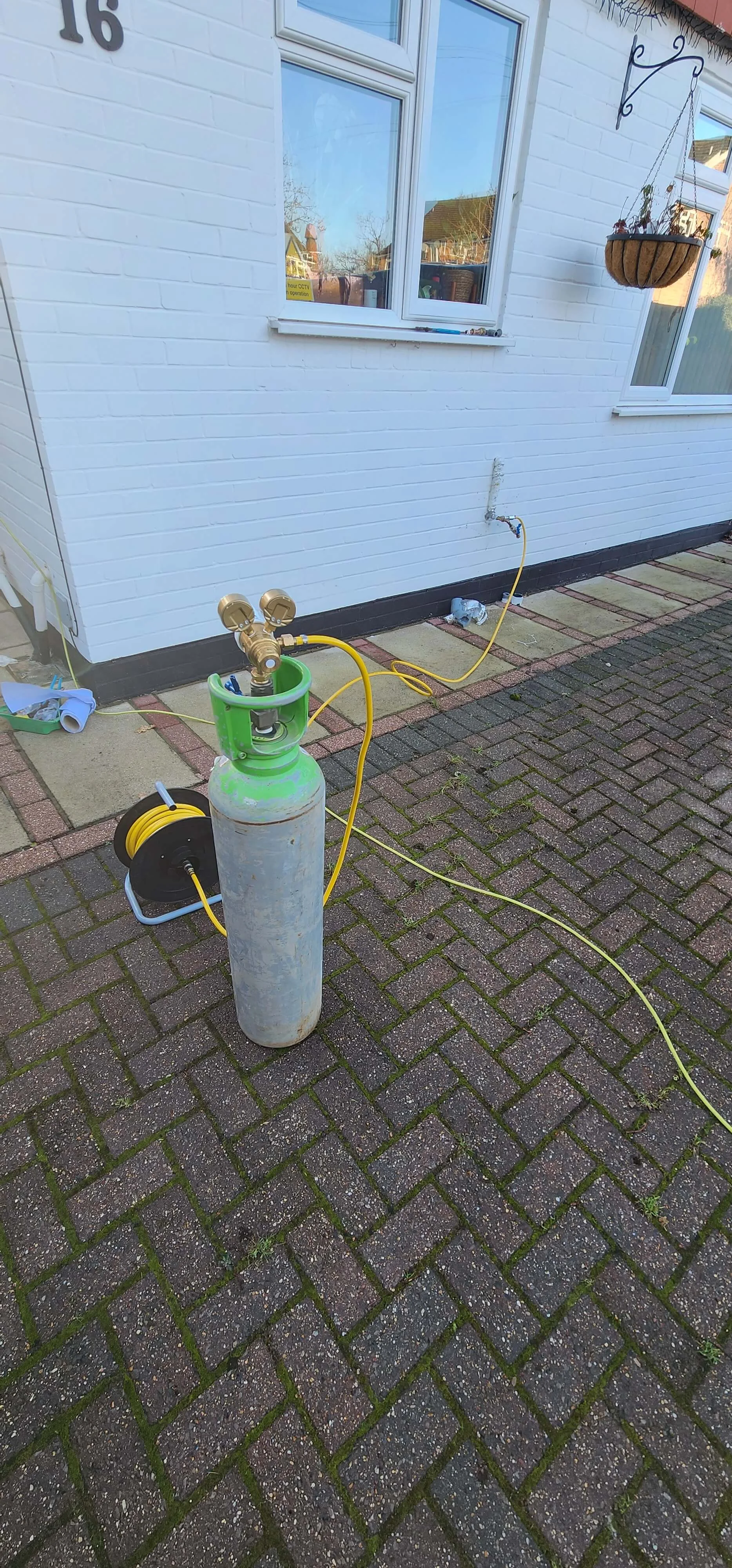 Tracer gas equipment set up for mains water leak detection in Addlestone