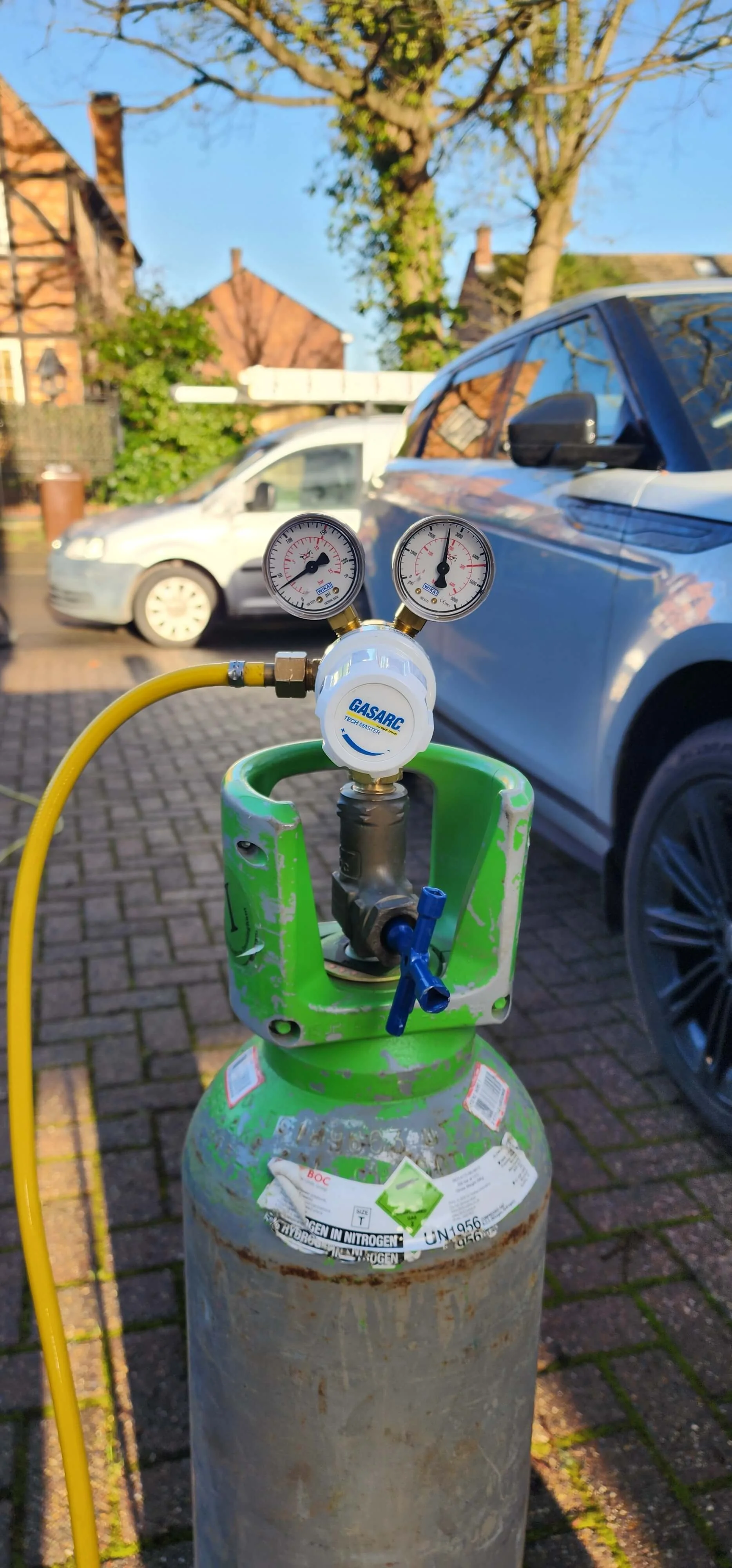 Pressure testing gauges used during mains water leak investigation in Addlestone