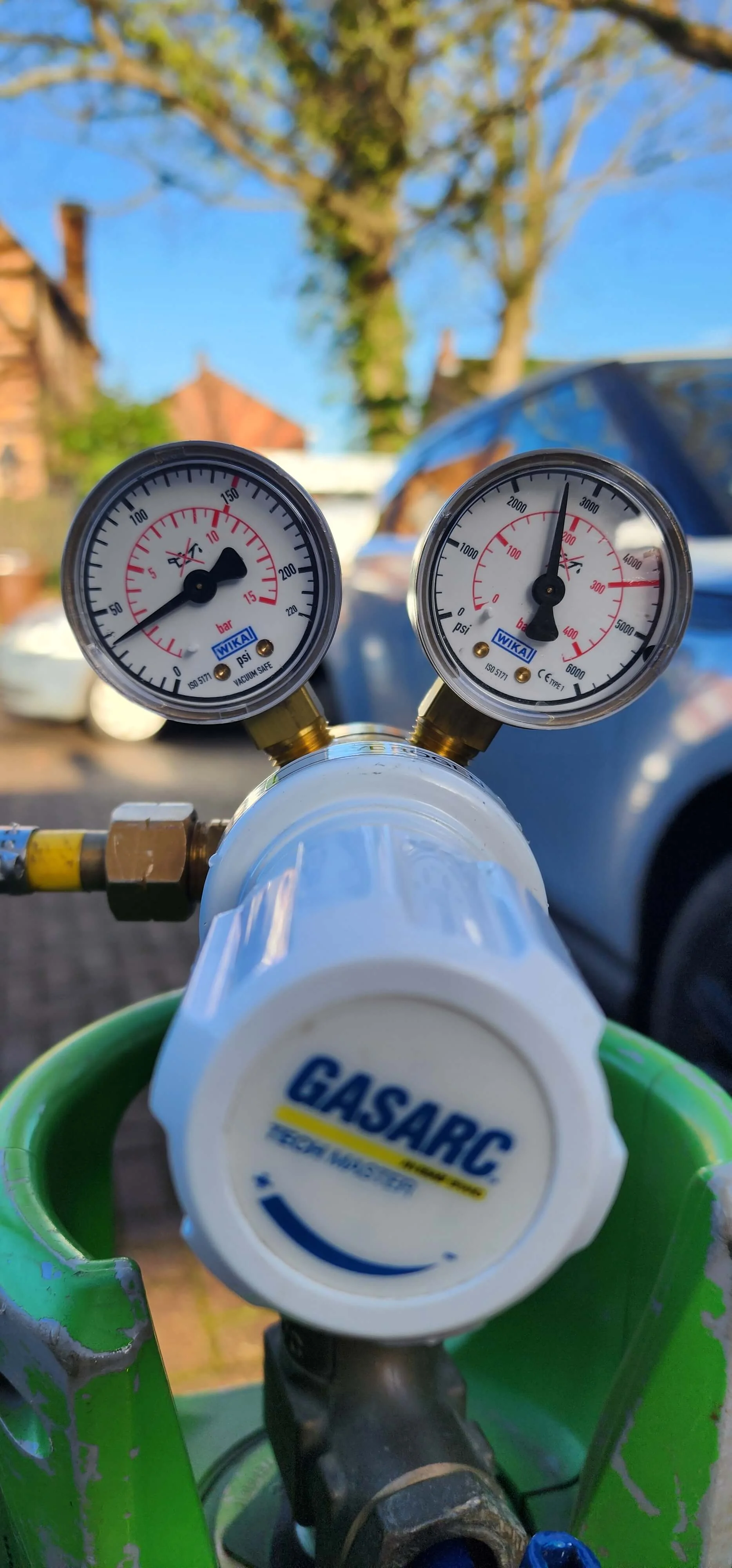 Close-up pressure gauge readings during Addlestone leak detection testing