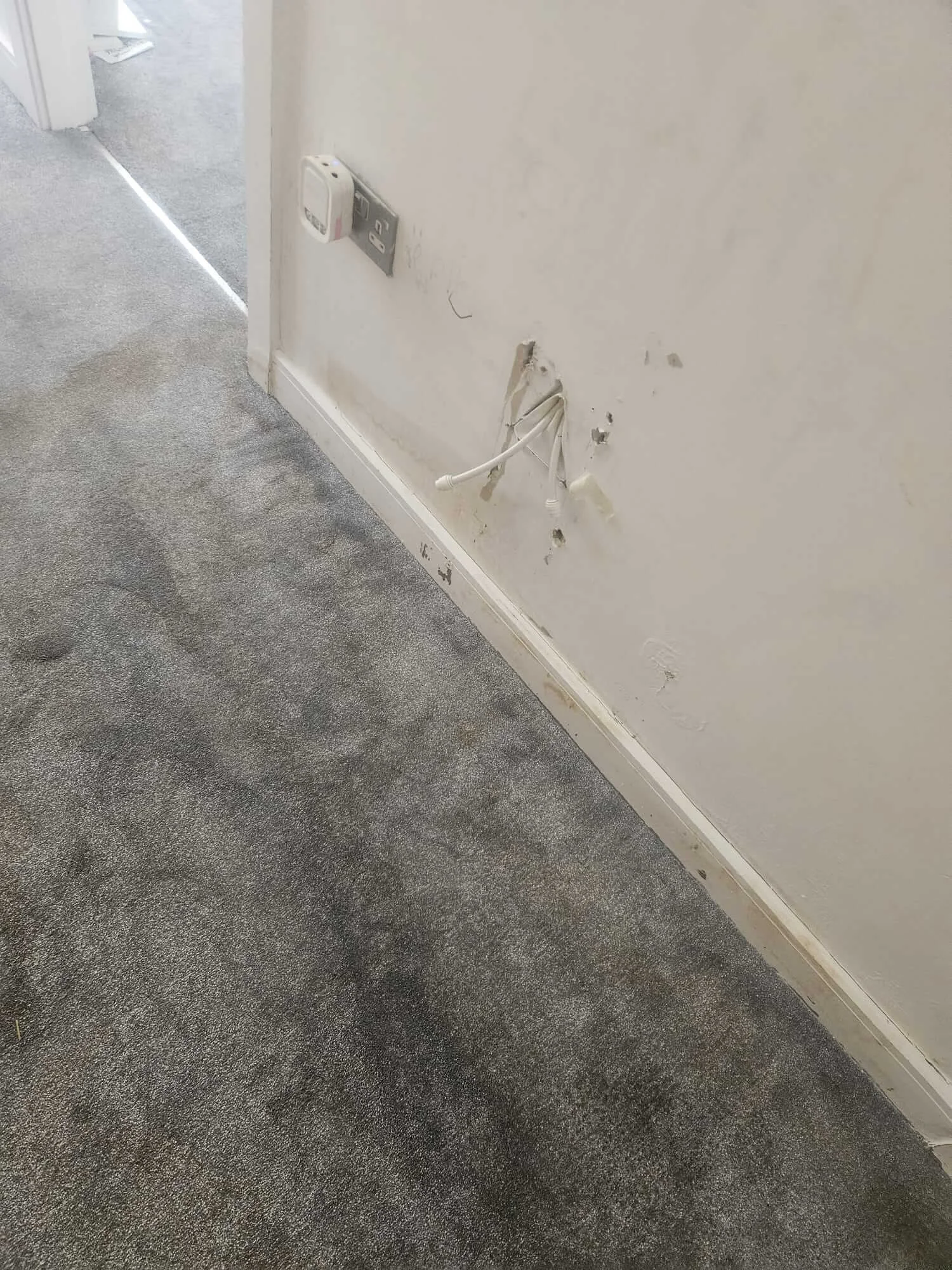 Lower wall area affected by bathroom water ingress in Barnet