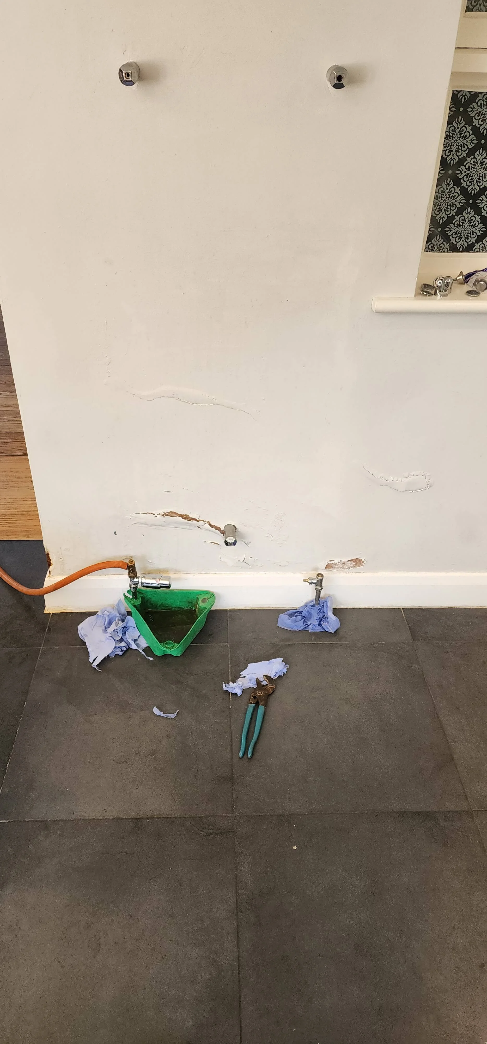 Radiator removed and pipework prepared for leak investigation in Betchworth