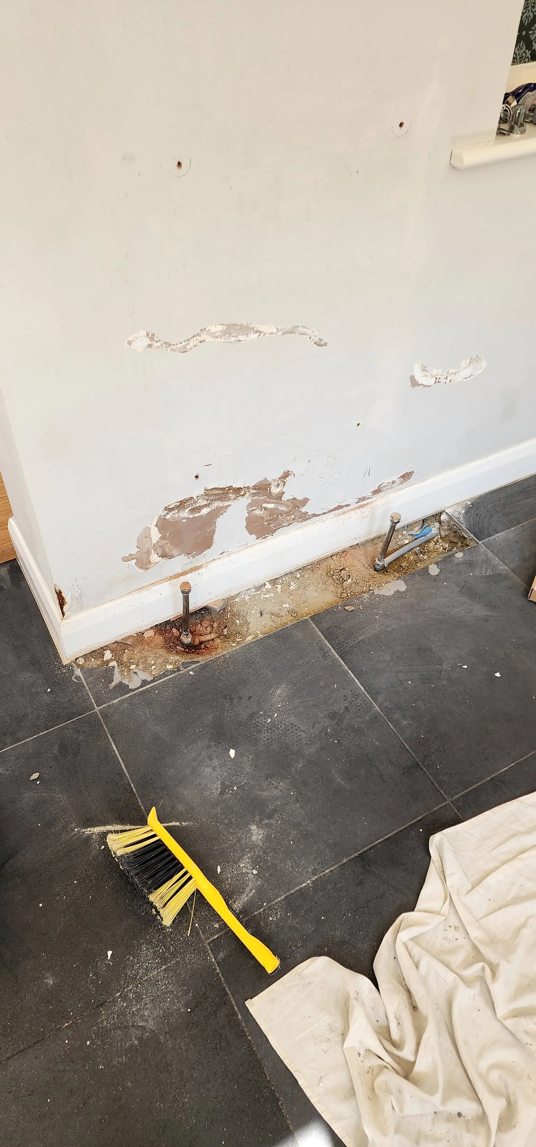 Targeted access area after central heating leak detection in Betchworth