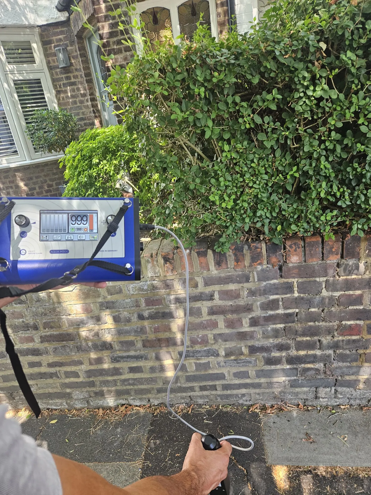 Acoustic detection equipment used outside an East Sheen property during mains water leak detection