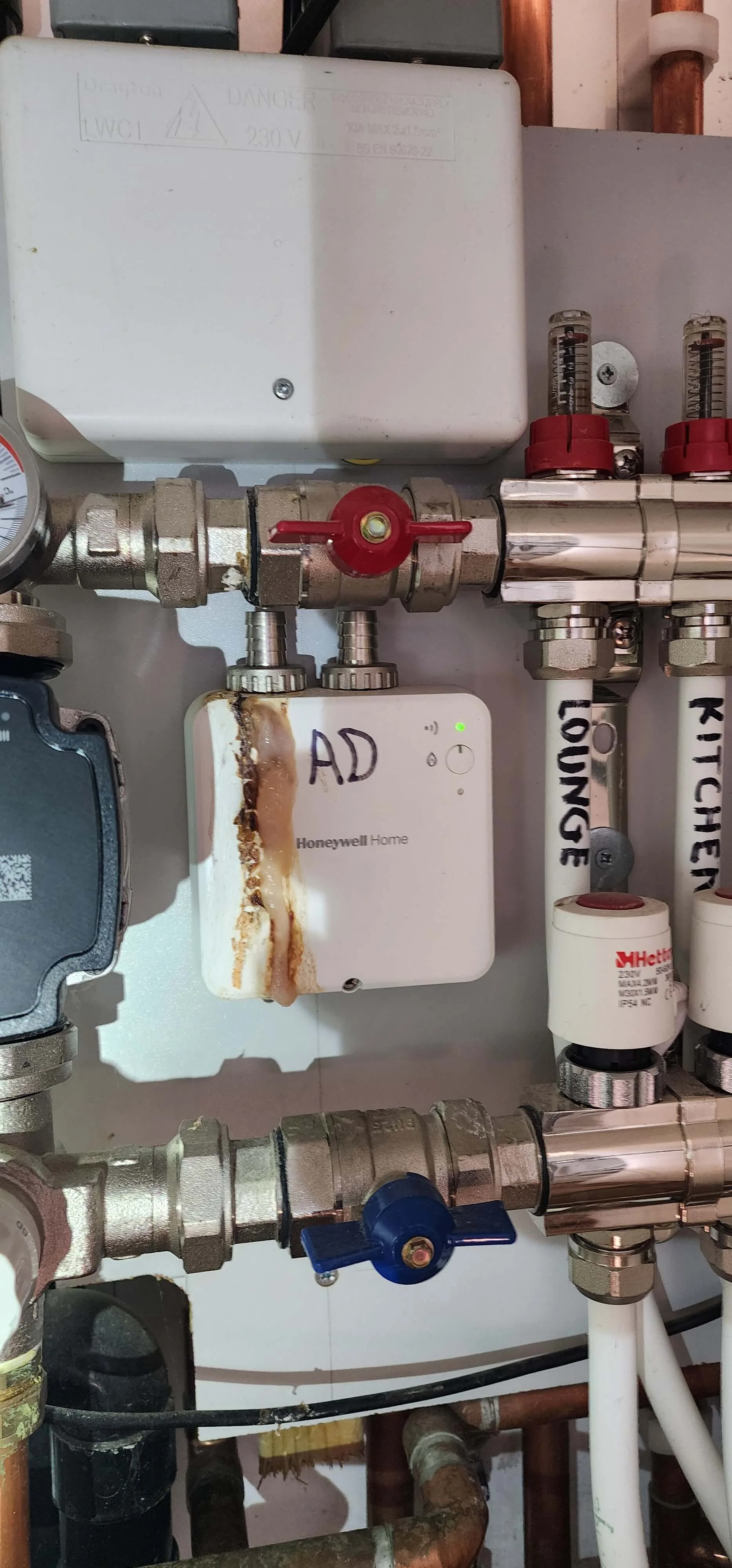 Heating manifold fitting evidence from Farnham central heating leak investigation