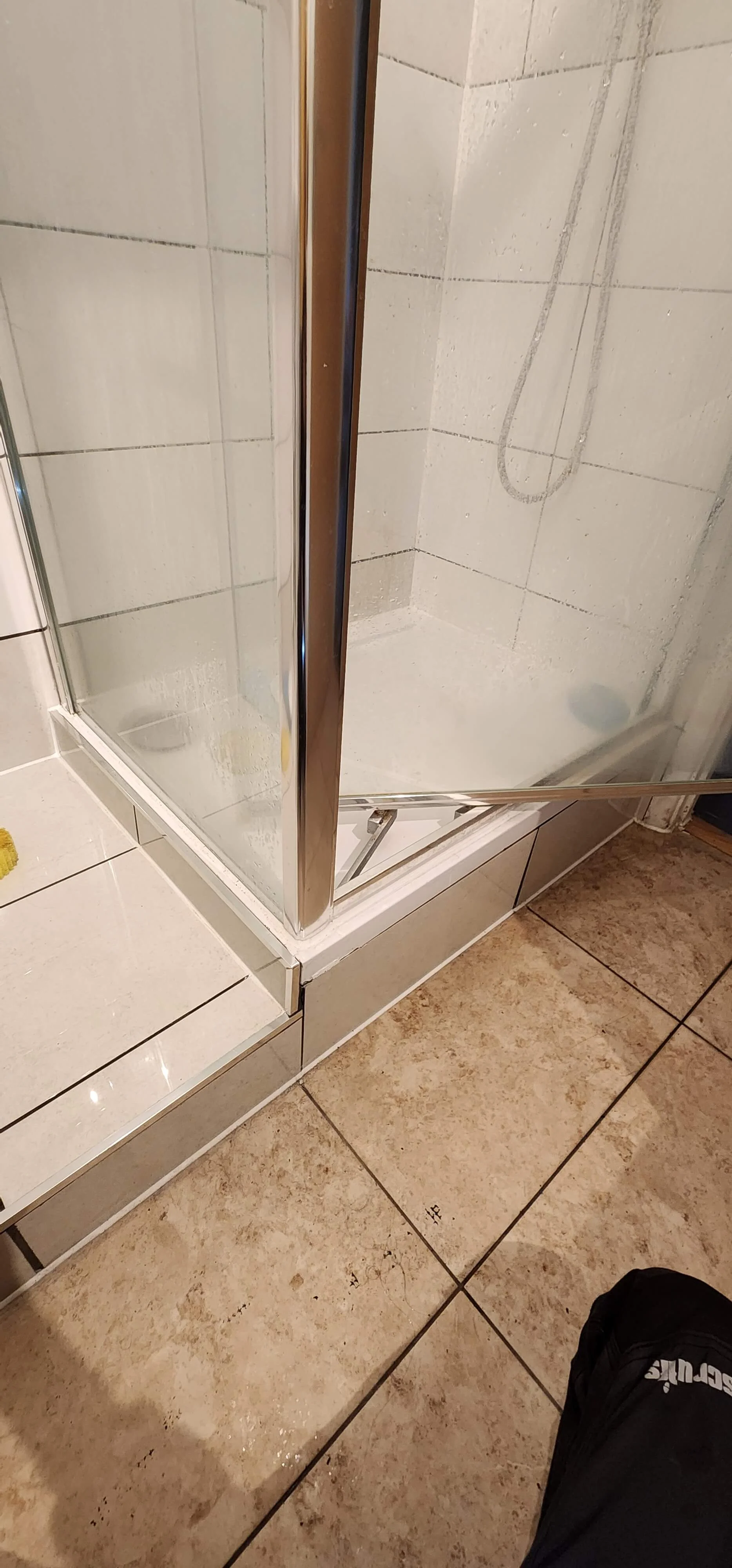 Shower tray area inspected during waste pipe leak detection in Portsmouth