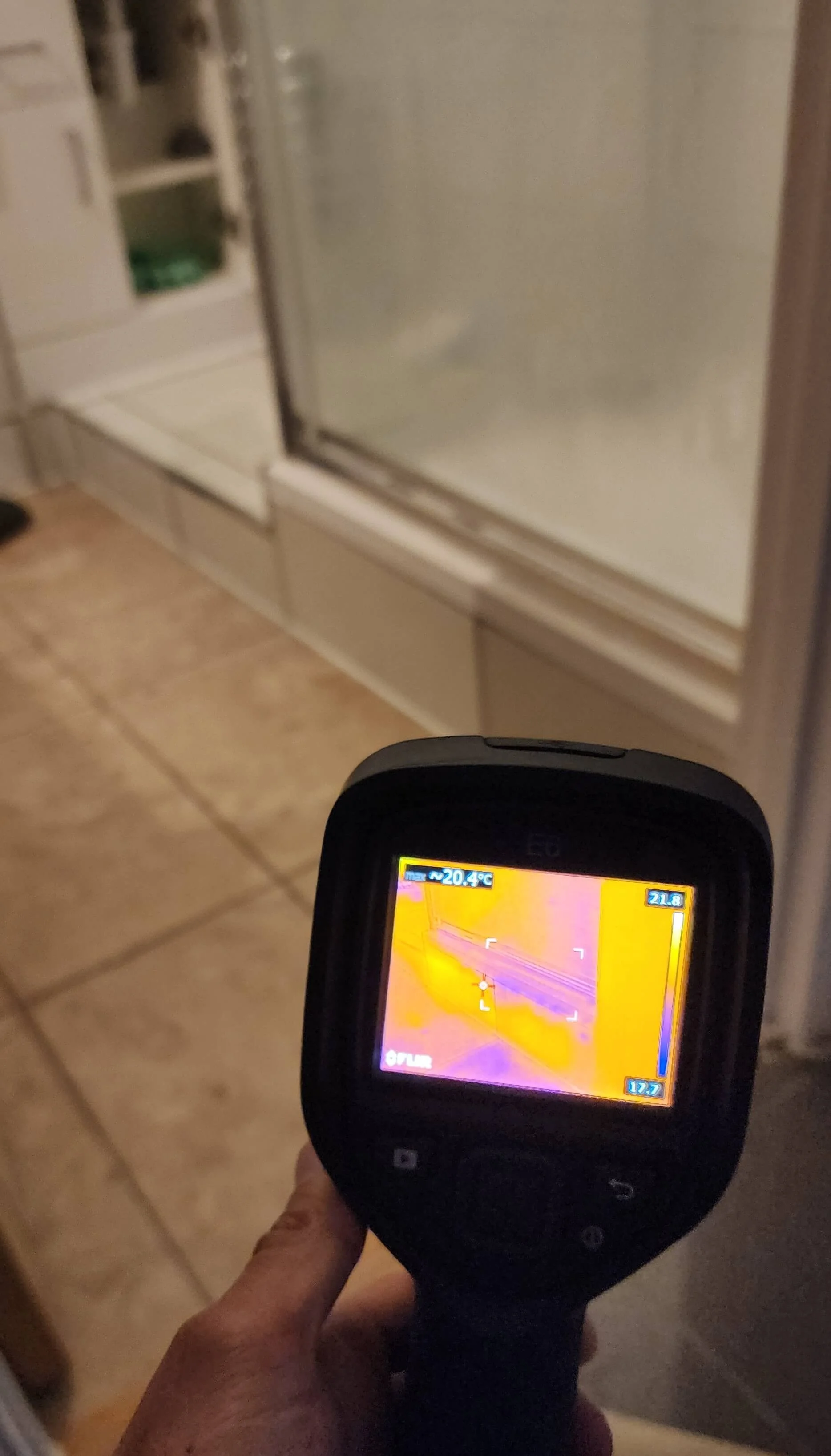 Thermal imaging used around shower tray during Portsmouth leak detection