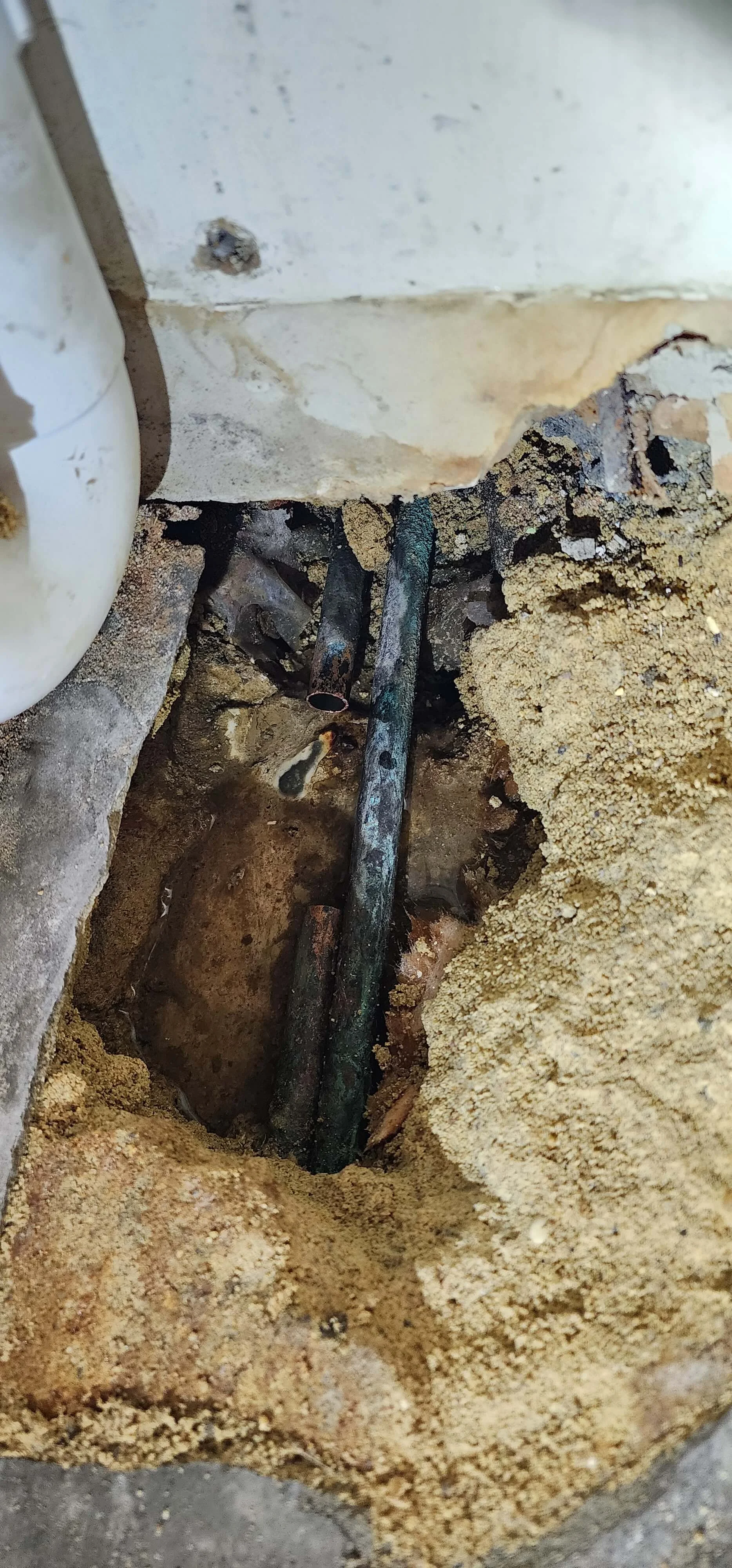 Failed heating pipework exposed during central heating leak detection in Reading