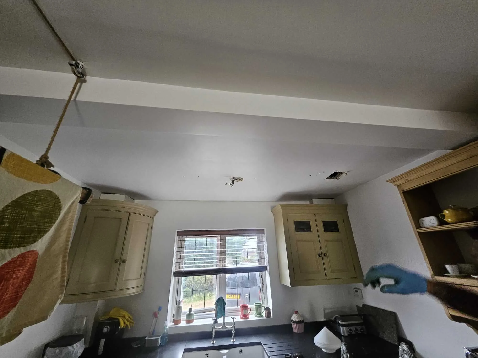 Kitchen ceiling area before concealed water leak access in Reading