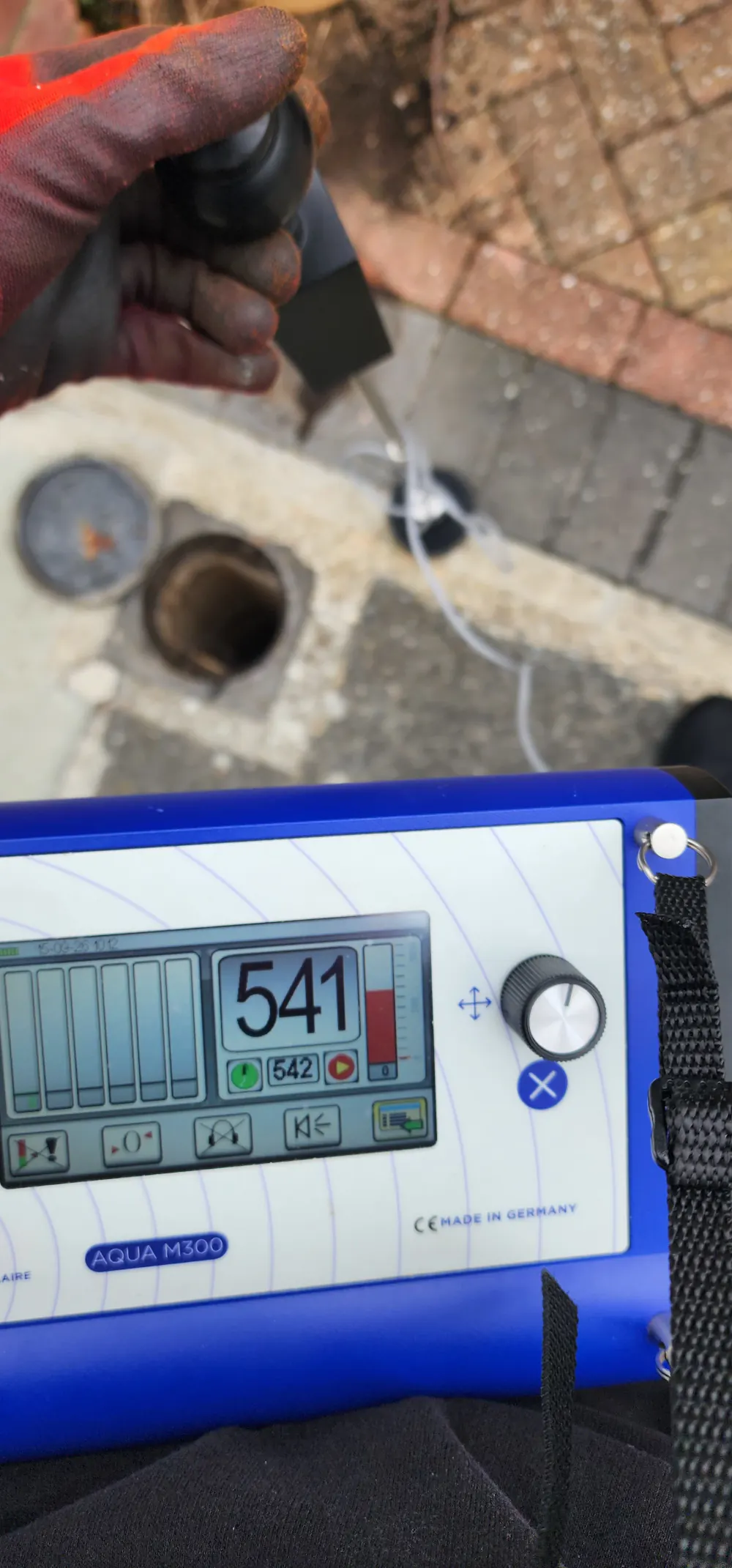Acoustic leak detector used beside an open external chamber near the water meter in Twickenham