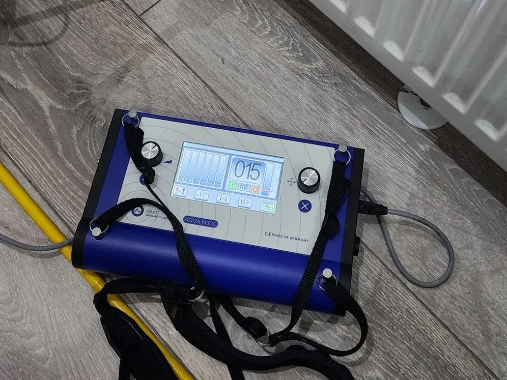 Leak detection equipment used during underfloor heating investigation