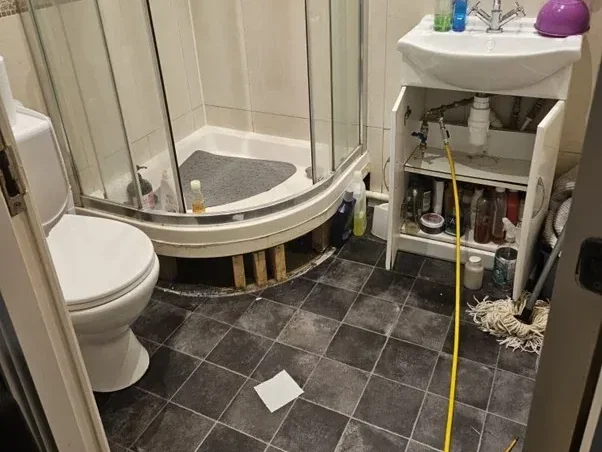 Bathroom and shower area inspected during leak detection survey