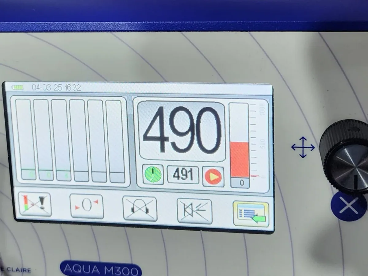 Acoustic leak detection readout used during underfloor pipe investigation